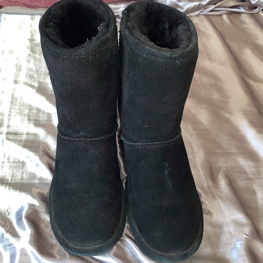 Black bear paw winter boots.